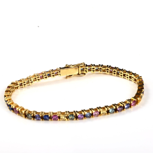 321 - A modern 14ct gold gem set line bracelet, bracelet length 19cm, 18g