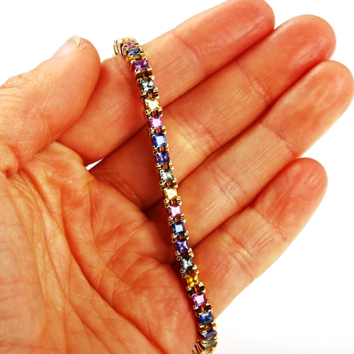 321 - A modern 14ct gold gem set line bracelet, bracelet length 19cm, 18g