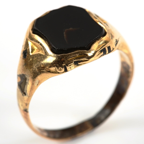 333 - An Antique gold plated onyx shield signet ring, setting height 13.3mm, size P, 3.6g