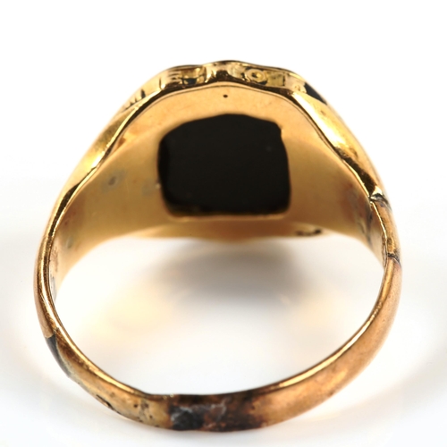 333 - An Antique gold plated onyx shield signet ring, setting height 13.3mm, size P, 3.6g