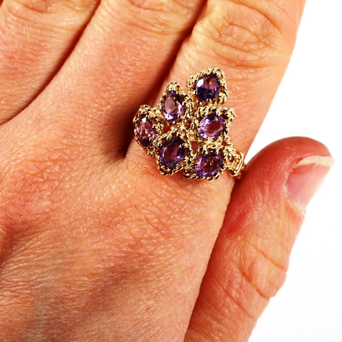 335 - A modern 9ct gold amethyst grape ring set with oval-cut amethysts, setting height 20.6mm, size Q, 4.... 