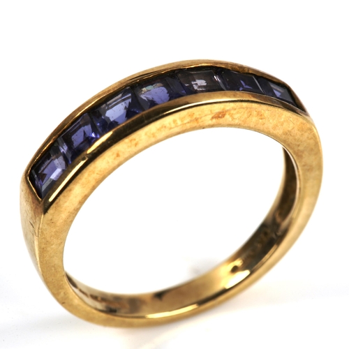 340 - A modern 9ct gold tanzanite half eternity ring, set with square-cut tanzanite, setting height 4.7mm,... 