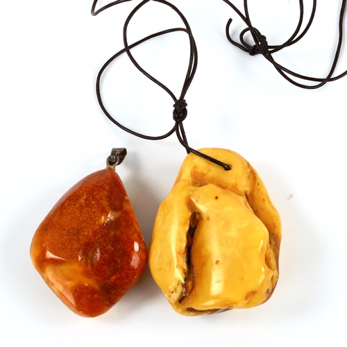 361 - 2 large Baltic amber pendants, largest height 55.6mm, 48.6g total (2)