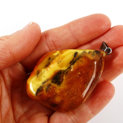 361 - 2 large Baltic amber pendants, largest height 55.6mm, 48.6g total (2)