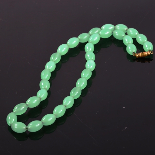 371 - A 1930s uranium glass bead necklace, bead length 12.8mm, necklace length 40cm, 44.8g