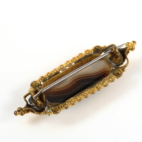 381 - A Georgian banded agate brooch, unmarked yellow metal cannetille decoration, brooch length 46.9mm, 5... 