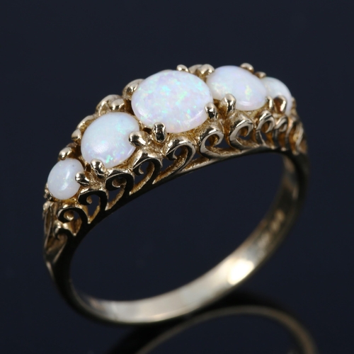 387 - A late 20th century 9ct gold graduated five stone opal half hoop ring, set with round cabochon opal,... 