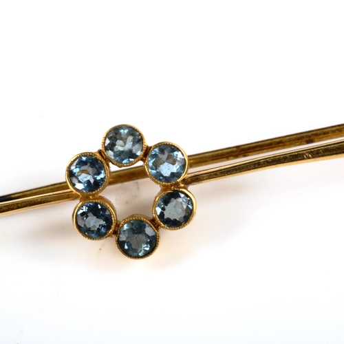 391 - A 15ct gold blue topaz cluster bar brooch, set with round-cut topaz, brooch length 58.8mm, 2.8g