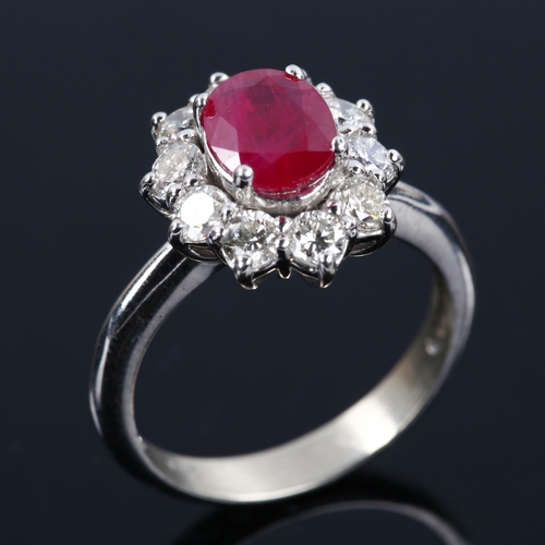 395 - A modern 14ct white gold ruby and diamond oval cluster ring, set with oval mixed-cut ruby and modern... 