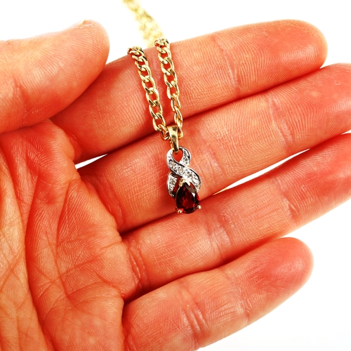 403 - A 9ct gold garnet and diamond pendant necklace, on 9ct flat hollow curb link chain, pendant height 1... 