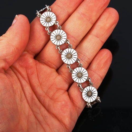 415 - ANTON MICHELSEN - a Vintage Danish vermeil sterling silver and white enamel daisy pattern bracelet, ... 