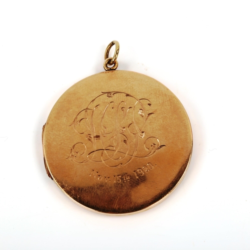 416 - An early 20th century 9ct rose gold photo locket pendant, maker's marks A&W, pendant diameter 35.9mm... 