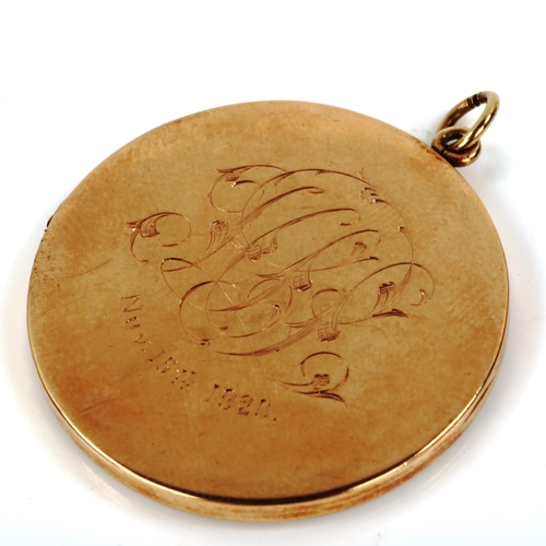 416 - An early 20th century 9ct rose gold photo locket pendant, maker's marks A&W, pendant diameter 35.9mm... 