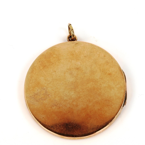 416 - An early 20th century 9ct rose gold photo locket pendant, maker's marks A&W, pendant diameter 35.9mm... 