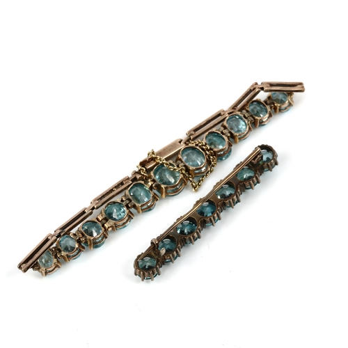 418 - An Art Deco graduated blue zircon matching line bracelet and brooch, largest zircon measures: 8.78mm... 