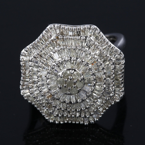 423 - A large modern sterling silver diamond cluster ring, tier set with single and baguette-cut diamonds,... 