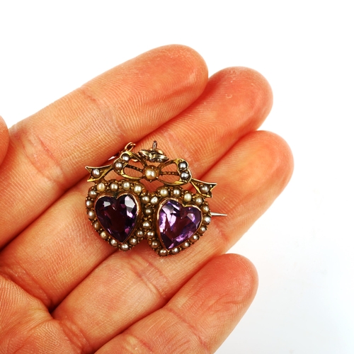 428 - A Victorian amethyst and pearl double sweetheart brooch, unmarked gold settings, brooch length 26.3m... 