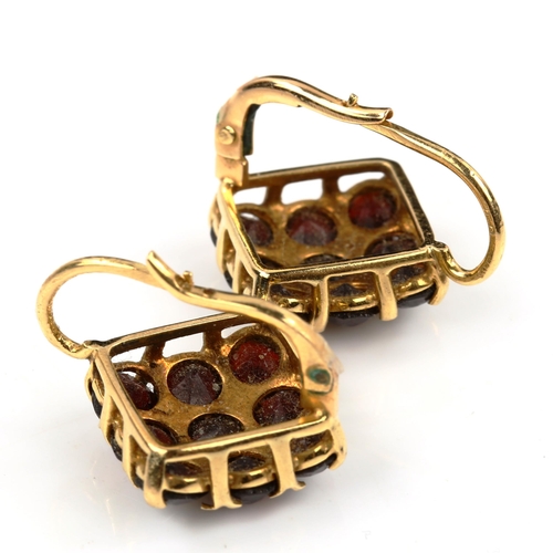 432 - A pair of 18ct gold garnet square cluster earrings, set with round-cut diamonds and English lock fit... 