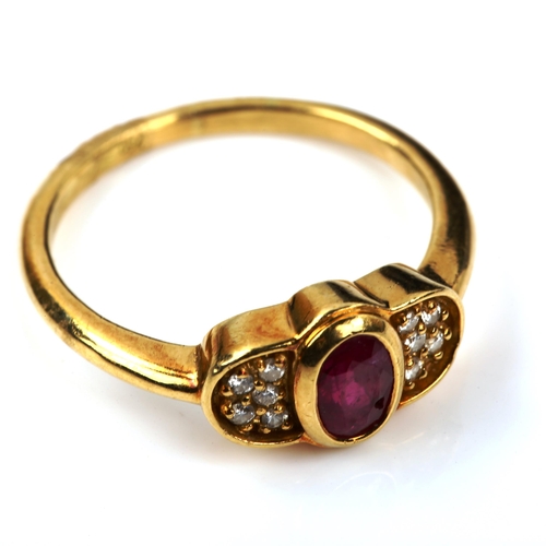 434 - A modern 18ct gold ruby and diamond dress ring, set with oval mixed-cut ruby and round-cut diamonds,... 