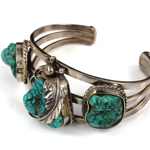 442 - A Native American Navajo sterling silver and turquoise torque bangle, band width 34mm, internal meas... 