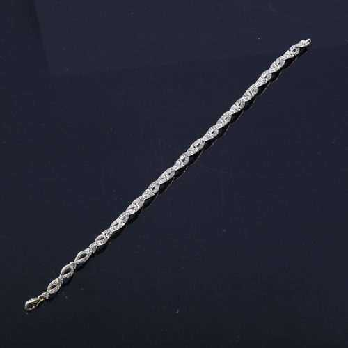 443 - A modern silver-gilt diamond twist tennis bracelet, bracelet length 19cm, 9.5g