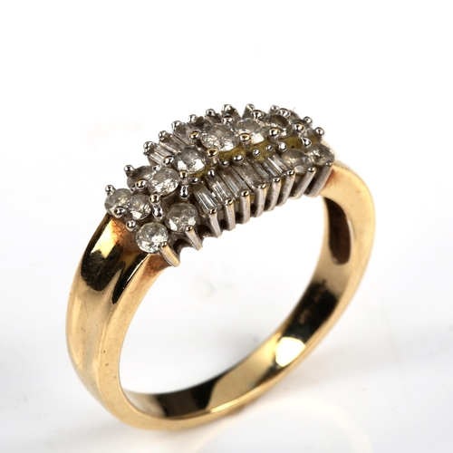 450 - A modern 9ct gold diamond cluster dress ring, set with modern round brilliant and baguette-cut diamo... 