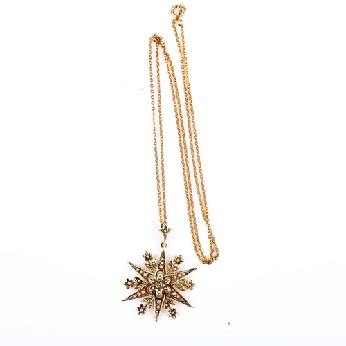 457 - A Victorian 9ct gold split pearl 6-rayed star pendant necklace, on 9ct fine cable link chain, pendan... 