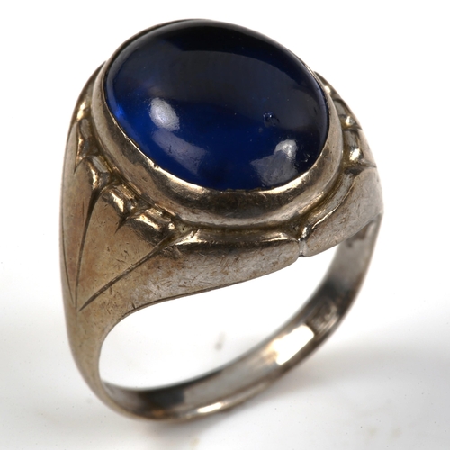 458 - A Chinese white metal blue stone dress ring, setting height 16.8mm, size J, 5.6g