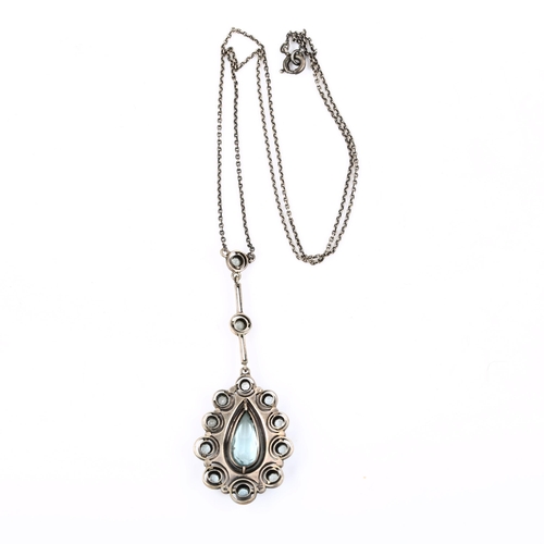 467 - An Art Deco Continental sterling silver and paste openwork pendant necklace, on fine cable link chai... 