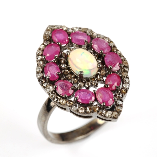 471 - A modern oxidised sterling silver opal ruby and diamond cluster panel ring, total diamond content ap... 