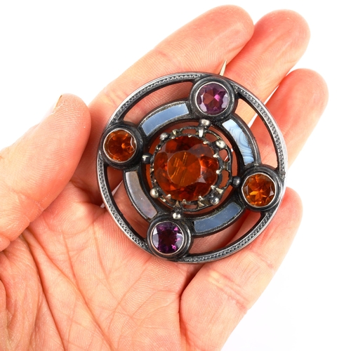 473 - A Scottish unmarked silver stone set targe shield target brooch, set with citrine amethyst and agate... 