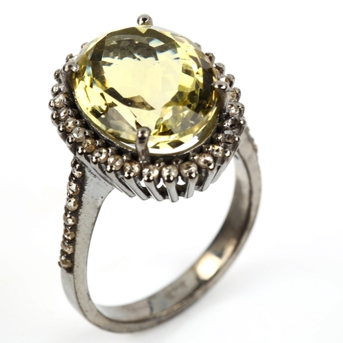 476 - A modern oxidised sterling silver lemon quartz and diamond cluster ring, total diamond content appro... 