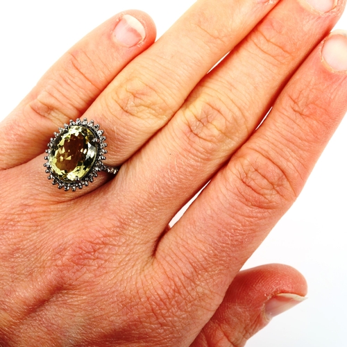 476 - A modern oxidised sterling silver lemon quartz and diamond cluster ring, total diamond content appro... 