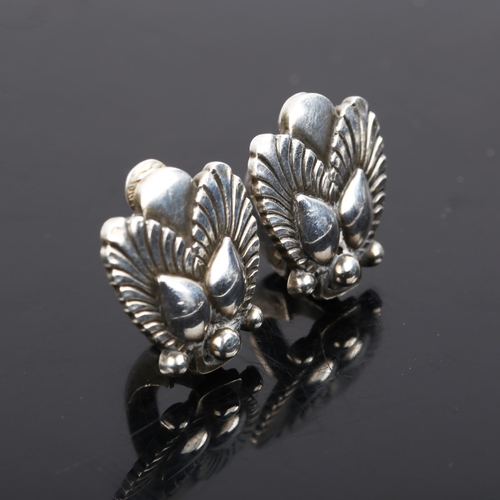 479 - GEORG JENSEN - a pair of Danish stylised sterling silver fern clip-on earrings, designed by Gundolph... 