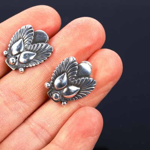 479 - GEORG JENSEN - a pair of Danish stylised sterling silver fern clip-on earrings, designed by Gundolph... 