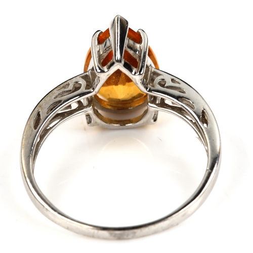 488 - A modern 9ct white gold citrine dress ring, set with pear-cut citrine, setting height 13.1mm, size N... 