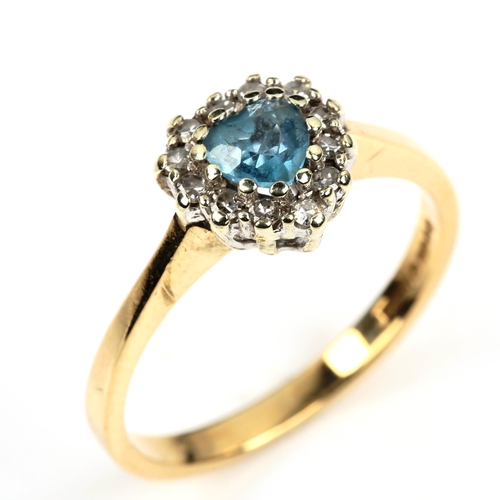 494 - A modern 9ct gold blue topaz and diamond heart cluster ring, setting height 8.8mm, size M, 2.2g