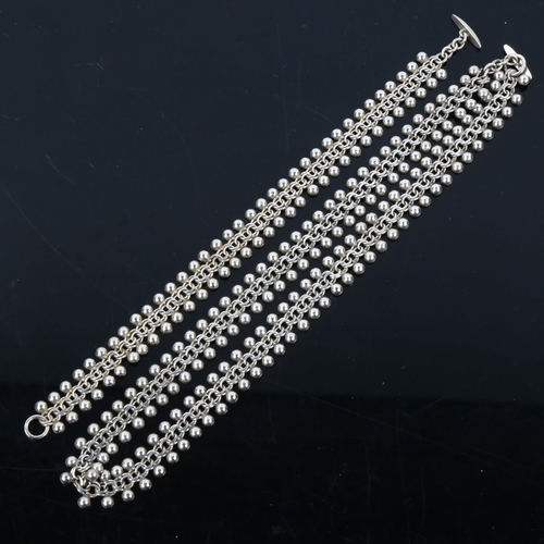 501 - HERMANN SIERSBOL - a Danish stylised sterling silver matching necklace and bracelet set, lengths 42c... 