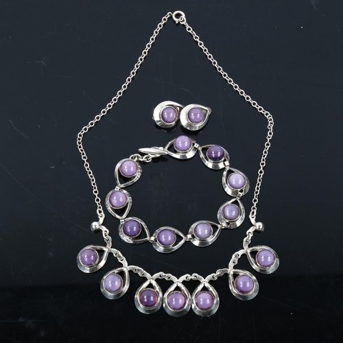 504 - HERMANN SIERSBOL - a Danish sterling silver and purple moonstone demi-parure, comprising fringe neck... 