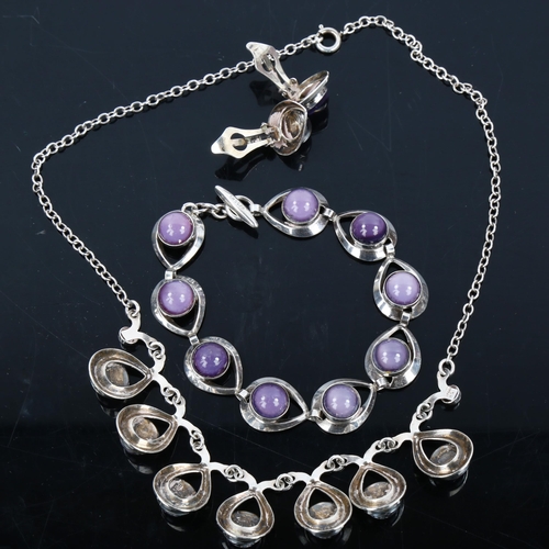 504 - HERMANN SIERSBOL - a Danish sterling silver and purple moonstone demi-parure, comprising fringe neck... 