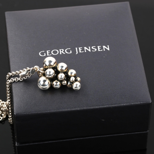 506 - GEORG JENSEN - a Danish sterling silver Moonlight Grapes pendant necklace, on original chain, pendan... 