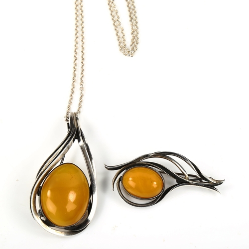 515 - 2 large Scandinavian sterling silver and amber pieces of jewellery, comprising pendant necklace and ... 