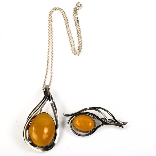 515 - 2 large Scandinavian sterling silver and amber pieces of jewellery, comprising pendant necklace and ... 