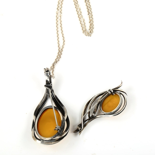 515 - 2 large Scandinavian sterling silver and amber pieces of jewellery, comprising pendant necklace and ... 