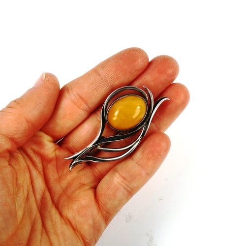 515 - 2 large Scandinavian sterling silver and amber pieces of jewellery, comprising pendant necklace and ... 