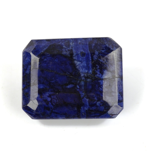 518 - An unmounted 156.15ct emerald-cut sapphire, 36.27mm x 29.20mm x 16.96mm, 31.2g, with EGL report card