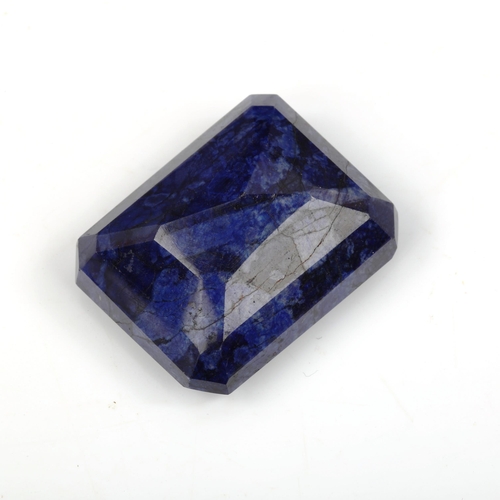 518 - An unmounted 156.15ct emerald-cut sapphire, 36.27mm x 29.20mm x 16.96mm, 31.2g, with EGL report card