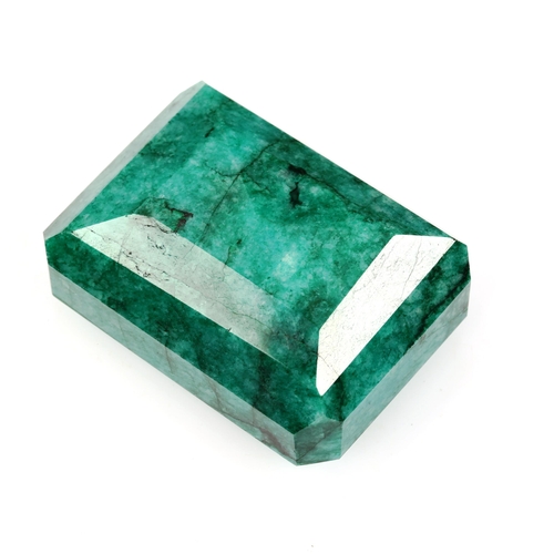 519 - An unmounted 516.70ct emerald-cut emerald, 53.33mm x 38.85mm x 25.14mm, 103.4g, with IGL & I report ... 