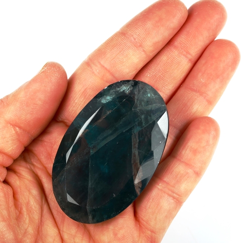 520 - An unmounted 255.7ct oval mixed-cut green fluorite, 55.00mm x 34.00mm x 18.20mm, 51.1g, with GLI rep... 