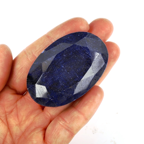 521 - An unmounted 480.8ct oval mixed-cut sapphire, 52.90mm x 34.85mm x 23.45mm, 96.1g, with GLI report ca... 